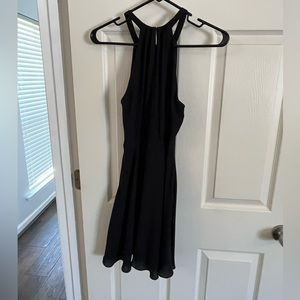 Sleeveless black mini dress
